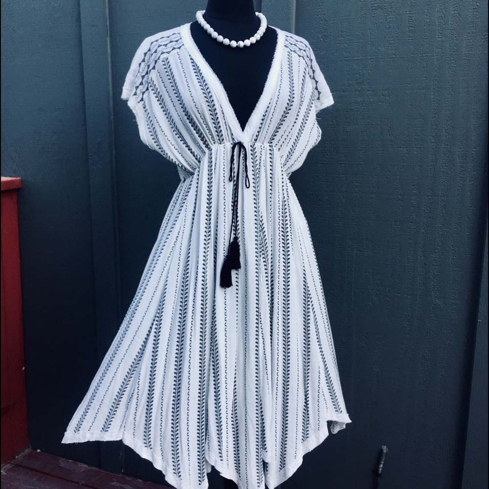 Beautiful Flowing White Handkerchief Hem Dress